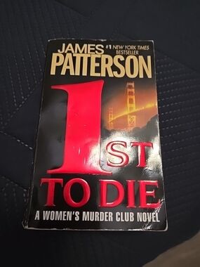 Paperbacks Black Cover with Red and Gold Accents - '1st to Die' Paperback